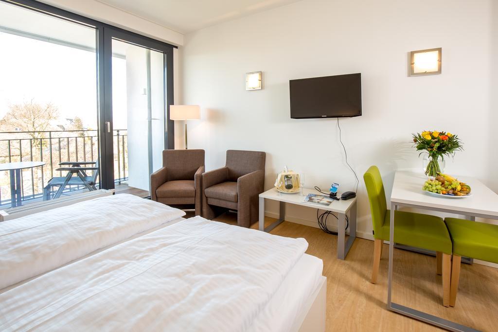 Carat Apartments Groemitz Grömitz Quarto foto